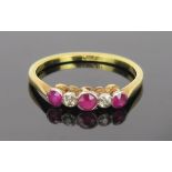 Ruby and Diamond Five Stone Ring in an 18ct stamped gold setting, size M, 1.1g