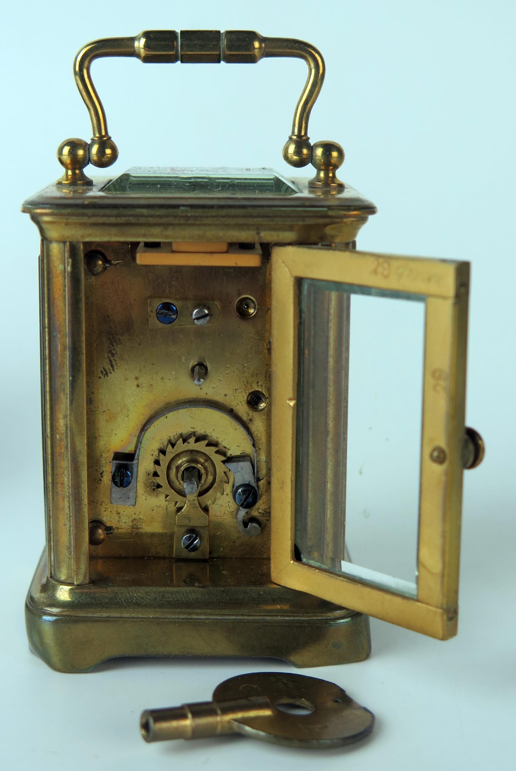 A late 19th century brass miniature carriage timepiece, with 3.25cm Arabic dial, the movement with - Image 4 of 4