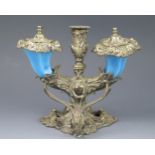 A late 19th century inkstand of floral design, with central taperstick flanked by two blue glass