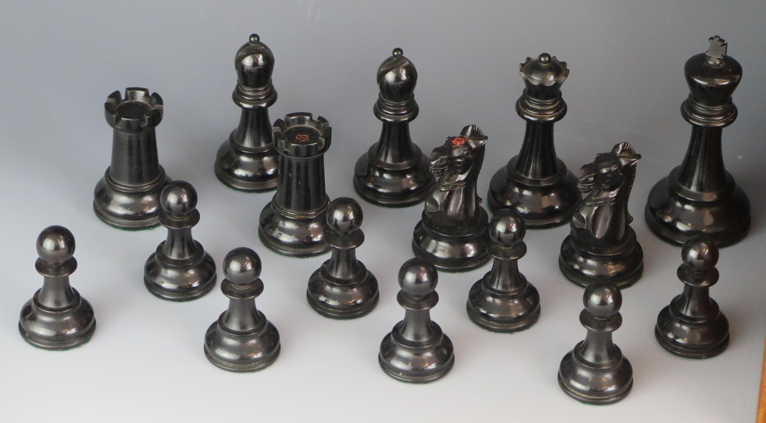 Jaques, London, a boxwood and ebonised Staunton pattern weighted chess set, the black king stamped - Image 3 of 3