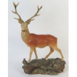Beswick Connoisseur Red Stag standing on a rocky out crop, oval gold mark Beswick England, black