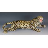 A large 20th Century Italian pottery prowling leopard, painted mark 1630/1, 63cm long.