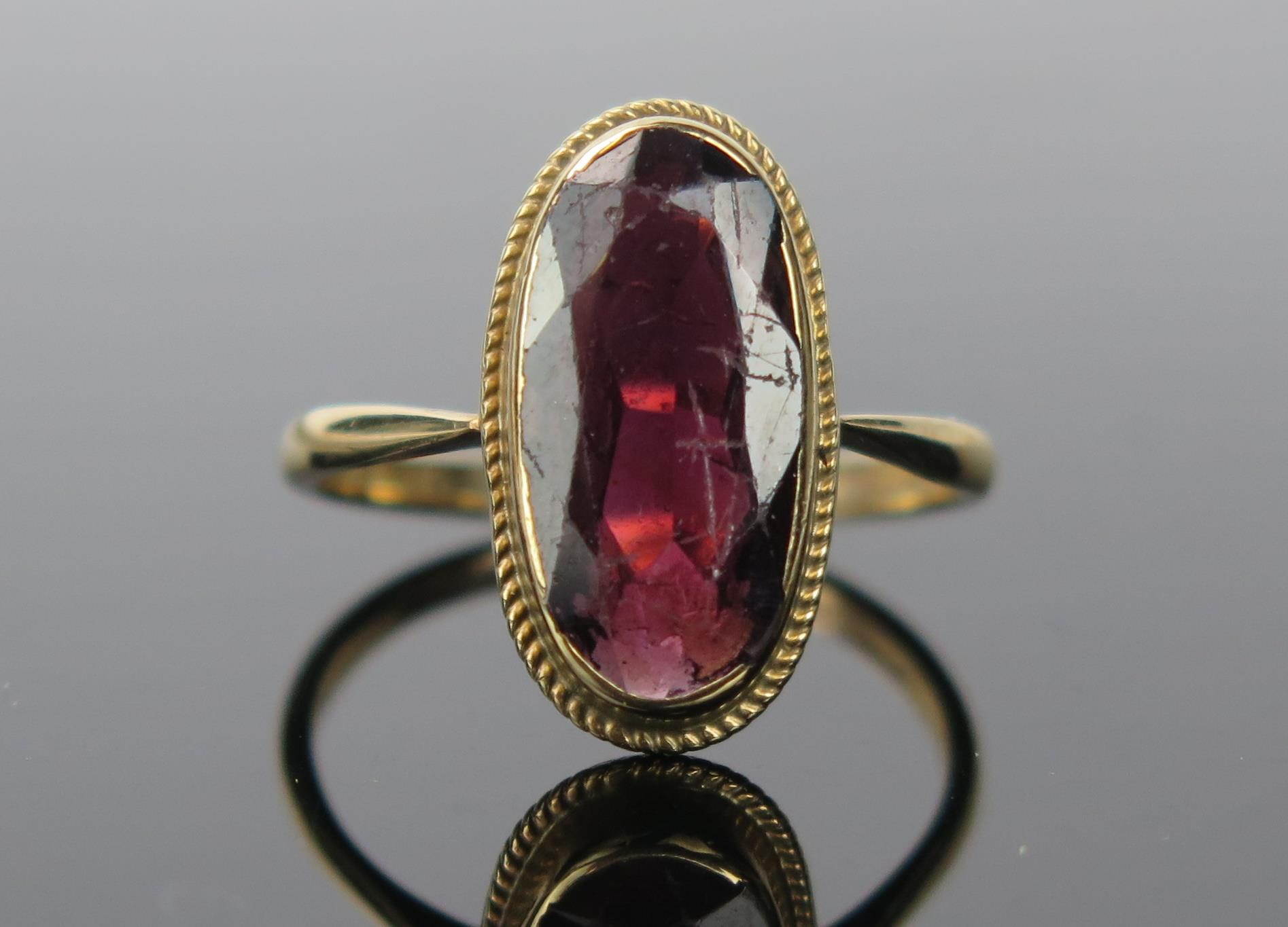 Modern 9ct Gold and Garnet Ring, size Q.5, 3.1g