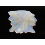 A Carved Opal of a Native American Chief, in head dress, 20x25mm.