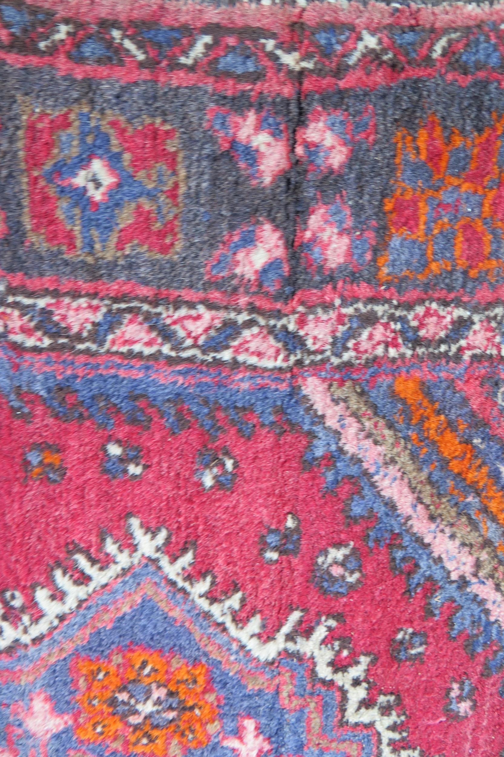 A large 20th Century Turkish Runner, wool carpet, geometric diamond lozenges, red ground, pyramid - Image 3 of 7