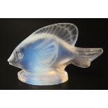 A Sabina opalescent glass model of a fish, on an oval base, signed Sabina, Paris, 10cm long.