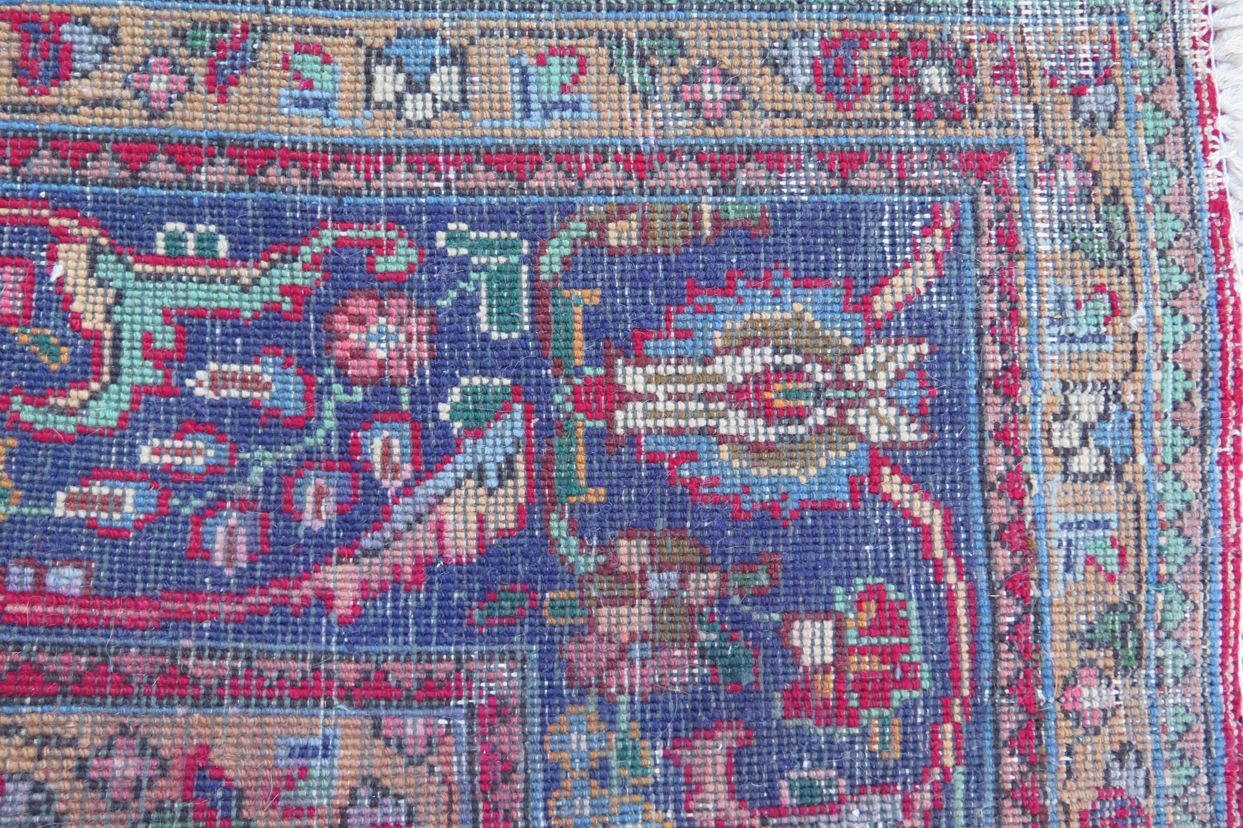 A 20th Century Kashan style wool carpet, blue central medallion, red field, cream spandrels, blue - Image 5 of 6
