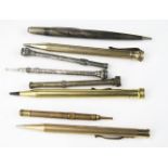 A collection of assorted silver, plated and gilt metal propelling pencils, various sizes, (8).