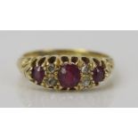 Ruby and Old Cut Diamond Ring in an 18ct gold setting, central stone 4.7x4.1mm, size M.25, 4.4g