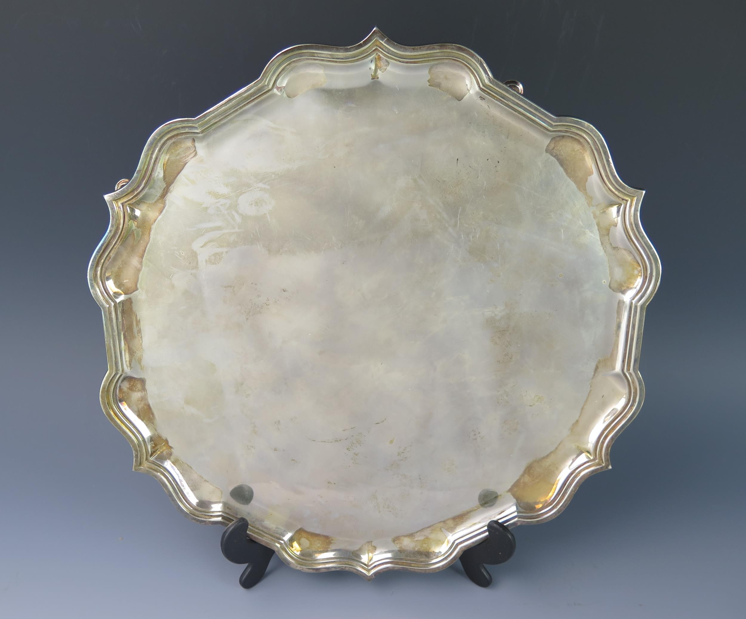 A George VI silver salver, maker CJ Vander Ltd, Sheffield 1938, of circular form, with a moulded