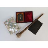 Daguerreotype Portrait of a Gentleman in leather case, mother of pearl card case (A/F), bronze