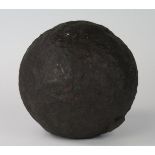 A 19th century cast iron cannon ball, 6ins diameter.