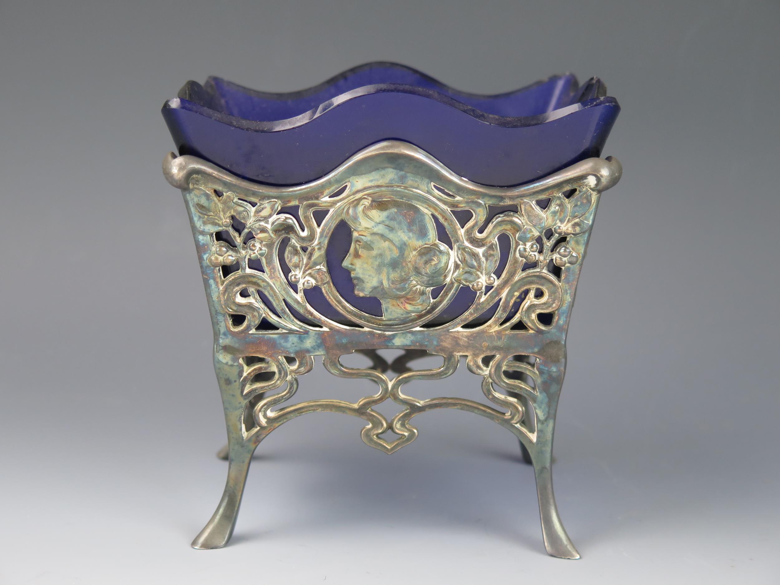 A WMF Art Nouveau period plated basket, of rectangular outline, with female masque and sinuous