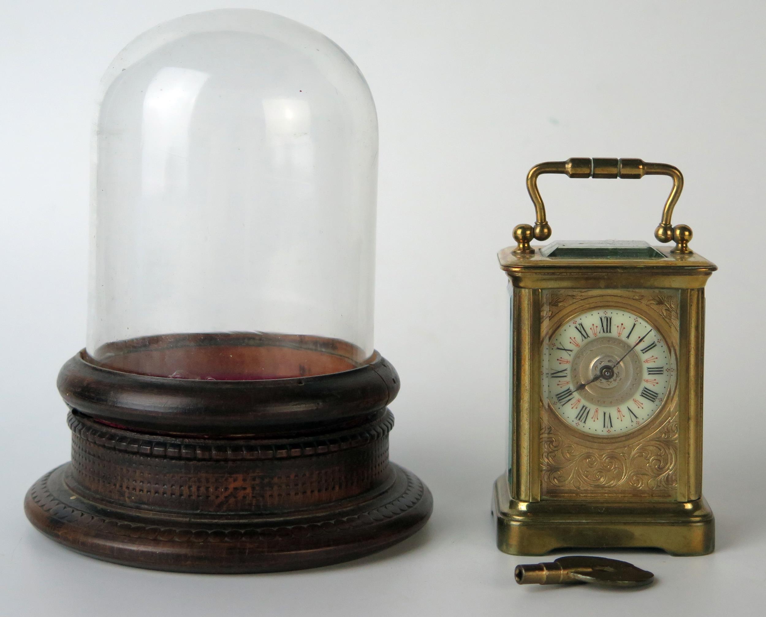 A late 19th century brass miniature carriage timepiece, with 3.25cm Arabic dial, the movement with