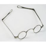 A pair of 19th century silver framed spectacles, unmarked, with folding arms.