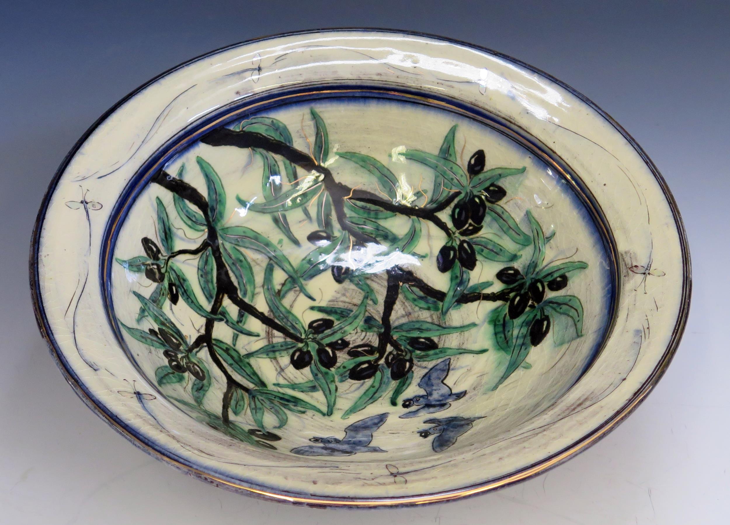 A studio pottery fruit bowl, of circular outline, decorated with birds flying over an olive bush, to - Image 2 of 3