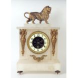 A late 19th century alabaster and gilt metal mounted mantel timepiece, of rectangular outline,