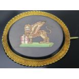 Antique Italian Micromosaic Brooch decorated with the lion of Venice in a high carat gold setting..
