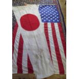 An American flag, 151 x 266cm, together with an international signal flag for No 1, 110 x 330cm.