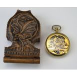 A Modern Hebdomas Gold Plated Pocket Watch in old carved tree stand