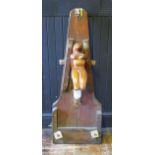 A Ships bowsprit, mounted with a female nude figurehead, overall height 122cm.