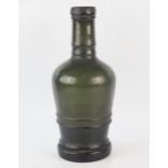 A late 18th century green glass bottle, with ring banded decoration, 33cm high.