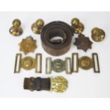 A collection of assorted belt buckles including Royal Marines, Royal Navy, Royal Marine helmet