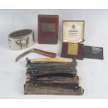 A collection of assorted savings banks, penknife and assorted razors.