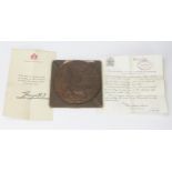 A World War One bronze death plaque Frederick George Hart, with accompanying letter contained in its