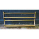 An Ercol open plate rack, with two graduated shelves and open back, 96cm wide.