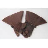 A pair of WWI pattern brown leather flying gloves with lined interiors.