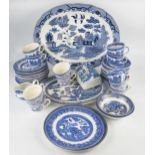A collection of assorted Willow pattern wares including, meat dishes dinner plates, side plates,