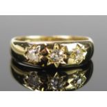 An Antique 18ct Gold and Diamond Three Stone Gypsy Ring set with old cuts, size K, 2.9g