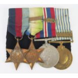 A World War II group of four, includes 1939-45 Star, Atlantic Star with France Germany clasp, War