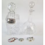A Royal Doulton crystal glass decanter and stopper, with silver "Sherry" label, another clear