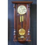 A late 19th century mahogany cased Vienna style regulator wall clock, of traditional design, the