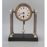 An Art Deco period chrome and faux ivory mantel timepiece, with 8cm Roman dial, raised on four plain