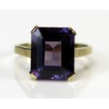 A 9ct Gold and Purple Stone Ring, the 12x10mm in a claw setting, size N.5, 3.8g. Stone tests as