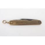 A 9ct gold and steel framed folding penknife, inscribed.