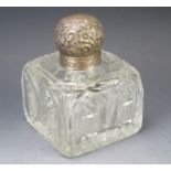 A Victorian clear glass and silver mounted scent bottle, of square outline, with hobnail decoration,
