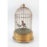 A 20th century birdcage automaton, the singing bird with moving head and beak, the cage of domed
