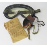 An American type IV pair of goggles M-1943 in original paper envelope and a pair of American type