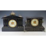 A late Victorian polished slate mantel clock of architectural outline, with three domes, to the