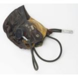 A WWII RAF C Type brown leather flying helmet, with Gosport tubes, worn stamp marks to liner.