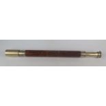 T. Cooke & Sons Ltd, a single drawer leather bound telescope, serial No 887, No 19 with War Office