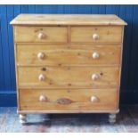 A Victorian pine chest of rectangular outline, with moulded border, containing two short and three