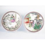 Two Chinese Republic porcelain plates, decorated with figures in garden landscapes, each with four