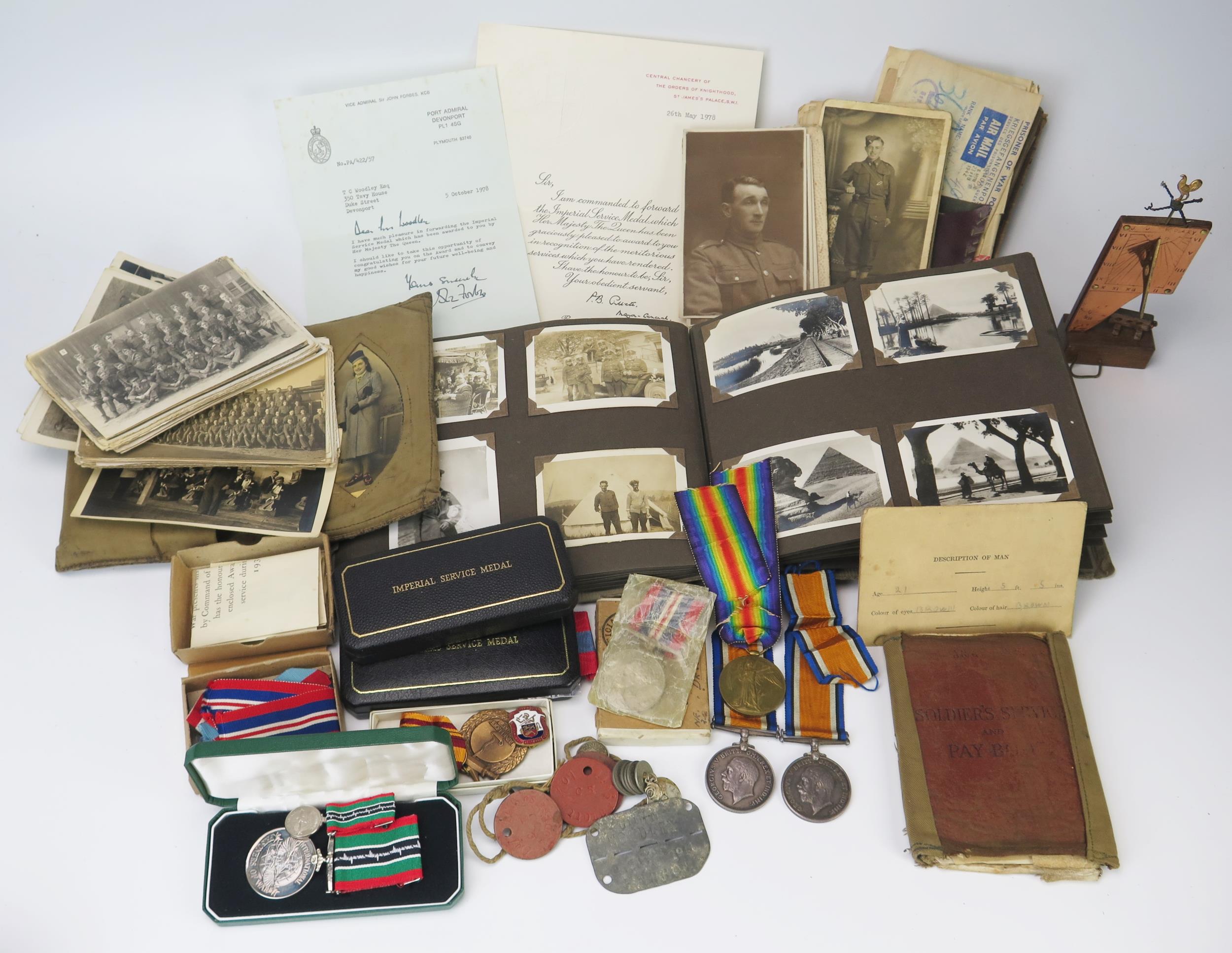 The Woodley Family of Devonport medals and ephemera, includes a WWI pair to 51602 Pte. J. J. Woodley
