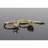 A Pair of Victorian Diamond Solitaire Earrings, the old cut stones c. 4-4.5mm and in an unmarked