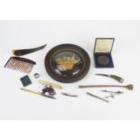 A small assortment of collectables including a bone needle case, bone handled mapping pen, shoe